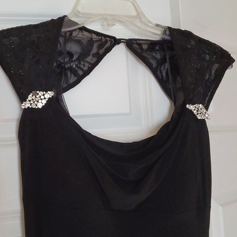 Black evening gown with lace shoulders